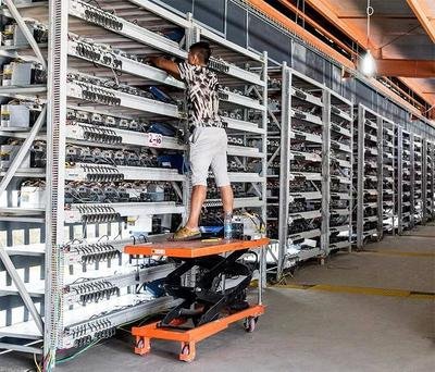 A large-scale mining farm showcasing the infrastructure and cooling systems necessary for efficient operation