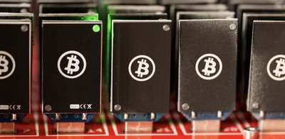 A vast mining farm showcasing rows of ASIC miners.