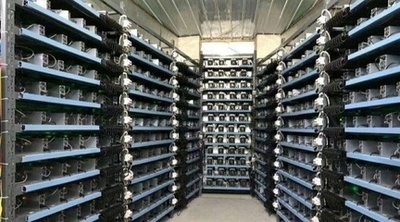 Modern Alephium mining farm with rows of energy-efficient servers